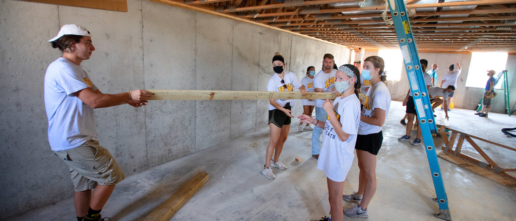 group of people at a building construction site