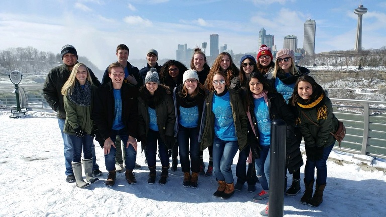 large group of student standing outside